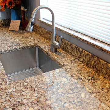 Transitional Cherry Kitchen with Tempered Rain Glass Backsplash
