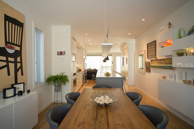 Example of a trendy dining room design in Calgary