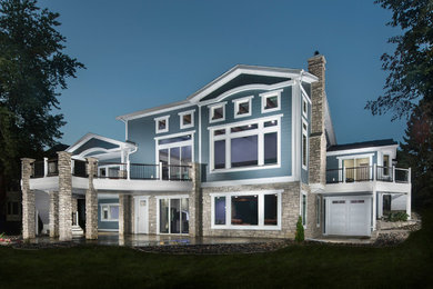 Inspiration for a large coastal blue one-story mixed siding gable roof remodel in Minneapolis