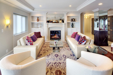 Mid-sized transitional formal and open concept dark wood floor living room photo in Kansas City with gray walls, a standard fireplace, a stone fireplace and no tv