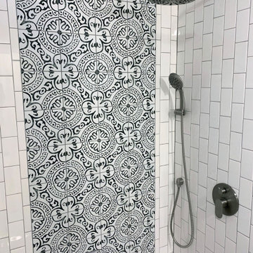 Black & white patterned tile bathroom