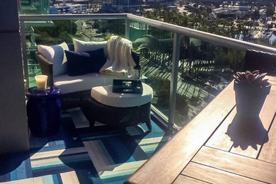 Example of a mid-sized trendy balcony design in Los Angeles with no cover