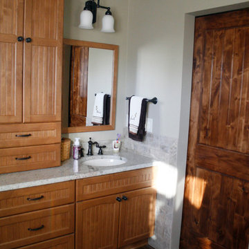 Spacious Master Bath with Sliding Barn Door in Troy