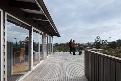Photo of a beach style deck in Melbourne with an awning.