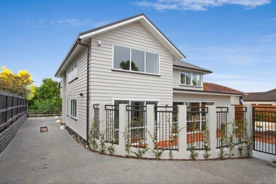 Photo of a transitional two-storey exterior in Auckland.