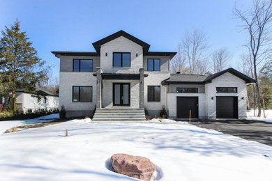 Example of a 1960s exterior home design in Toronto