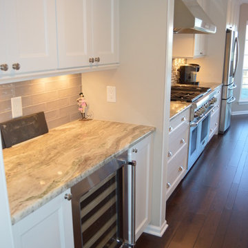 Kitchen Remodel with Dove White Cabinetry and Fantasy Brown Granite Tops