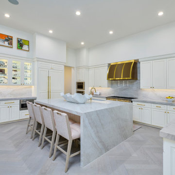 A modern kitchen all in Benjamin Moore "Simply White"