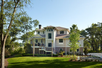 Inspiration for a contemporary beige three-story concrete fiberboard exterior home remodel in Charleston