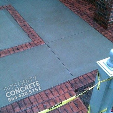 Stamped concrete brick border