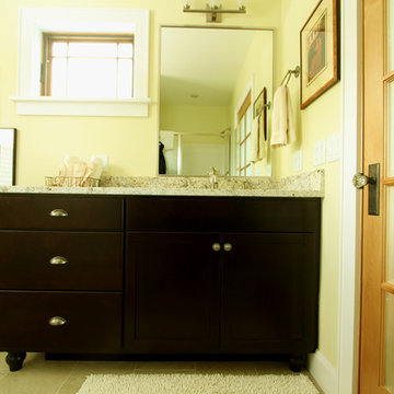 Dark Stained Shaker Vanity with White Persia Suede Granite Countertop