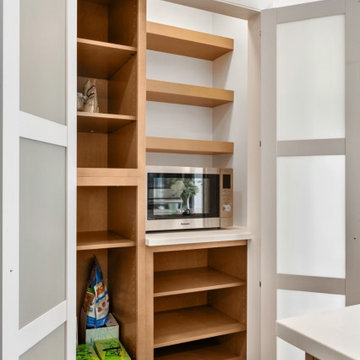Pantry with Frosted Glass Bifold Doors | Kitchen Storage Design