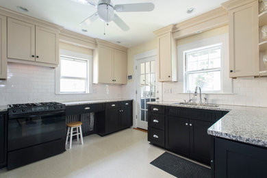 Enclosed kitchen - mid-sized craftsman u-shaped linoleum floor enclosed kitchen idea in Boston with a double-bowl sink, recessed-panel cabinets, beige cabinets, granite countertops, white backsplash, subway tile backsplash, black appliances and a peninsula