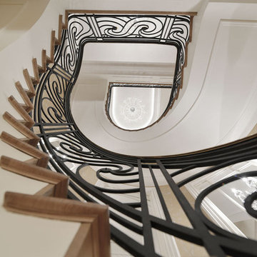 Queens Gate Mews - Helical Staircase with Laser Cut Balustrade and Brass Handrai