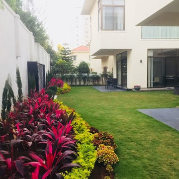 Adarsh Palm Retreat villa landscaping