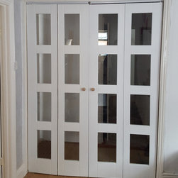 Bi-fold doors used as room dividers - Internal Doors