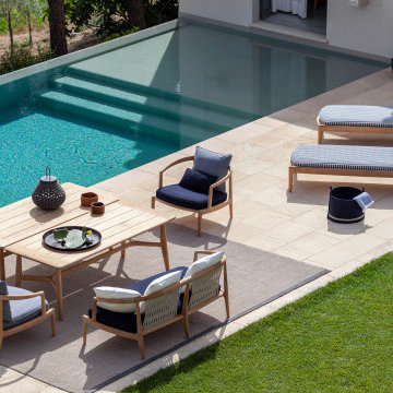 The poolside relaxation area offers a space for social gatherings