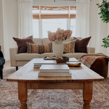 Farmhouse Family Room with Pinch Pleat Curtains as a finishing touch