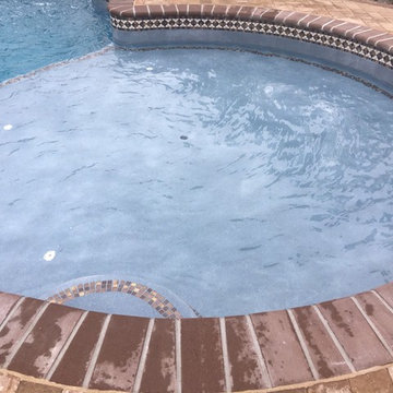 Lower Macungie large custom pool with spa, sunshelf, deck jets, and fountains