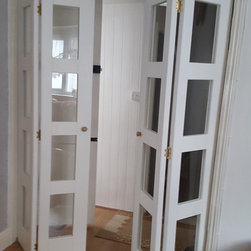 Bi-fold doors used as room dividers - Internal Doors