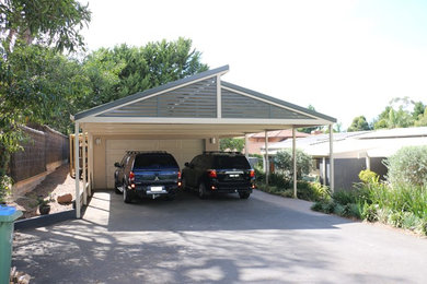 Design ideas for a large modern detached two-car carport in Melbourne.