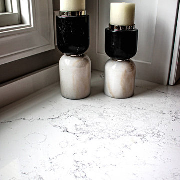 White Transitional Kitchen with Black Hardware and Glass Tile Backsplash