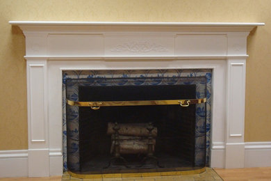 Inspiration for a mid-sized open concept family room remodel in Other with a standard fireplace and a tile fireplace