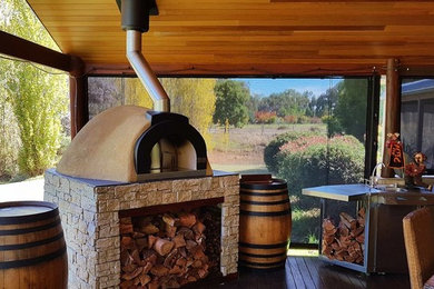 Photo of an open plan kitchen in Perth.