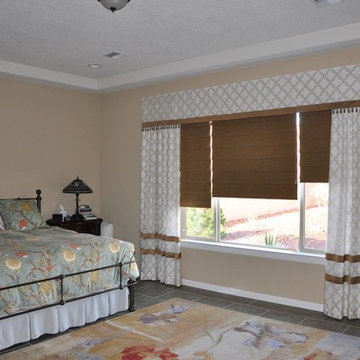 White and Bronze Draperies with Bronze trim and Blackout Roman Shades