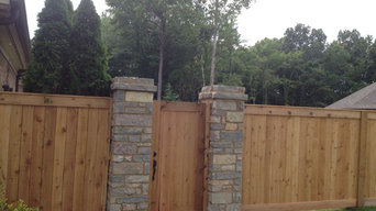 Shea rd cedar fence with stone pillars