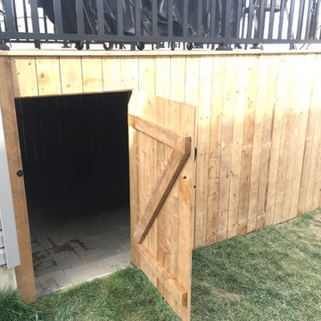 Multiple level deck with a storage space under and a hot-tub place