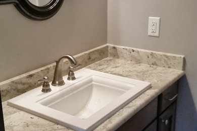 Example of a minimalist powder room design in New Orleans