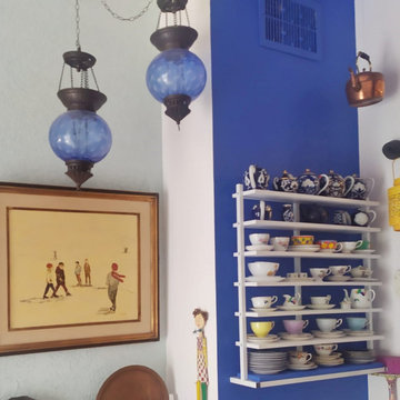 morocco lamps next to European tea cup collection