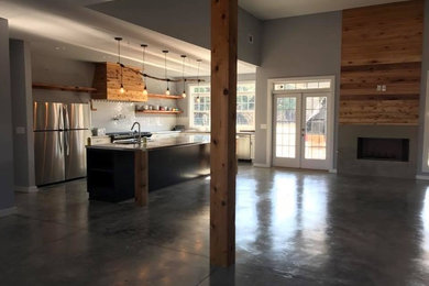 Minimalist concrete floor kitchen photo in Orange County