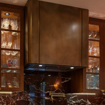 Timeless Kitchen Design with Bold Brass Range Hood