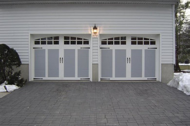 Design ideas for a contemporary attached garage in Newark.