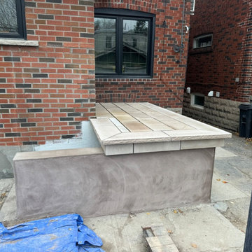 Concrete Back Deck Transformation To Masonry Natural Stone Porch and Steps