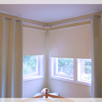 Black out Roller shades underneath blackout drapery