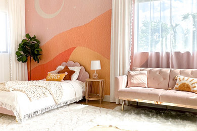 Example of a girl wallpaper childrens' room design in Los Angeles with multicolored walls