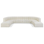 Meridian Furniture - Arc Vegan Leather Upholstered 10-Pc. U-Shaped Modular Sectional, Cream - Unleash modern opulence with the Arc Vegan Leather 10pc. Sectional. Crafted for the modern connoisseur, this Sectional injects an air of refined luxury into any space. Its sleek silhouette, upholstered in supple cream vegan leather, exudes timeless sophistication while the deep channel tufting adds textural intrigue, further elevating the chair's visual appeal. The modular design makes it a versatile chameleon, effortlessly adapting to your evolving needs and preferences. Whether you envision it gracing a chic living room corner, basking in the glow of a bedroom window, or adding a touch of drama to a home office, the Arc seamlessly complements your unique interior aesthetic.