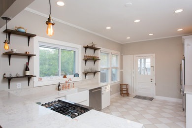 Inspiration for a cottage l-shaped ceramic tile and beige floor enclosed kitchen remodel in Tampa with a farmhouse sink, white cabinets, granite countertops, stainless steel appliances and no island