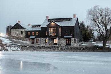 Inspiration for a cottage brown two-story gable roof remodel in Boston