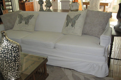 Living room - traditional living room idea in Other