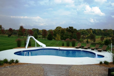 Island style pool photo in Louisville