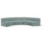 Meridian Furniture - Arc Vegan Leather Upholstered 6-Pc. U-Shaped Modular Sectional, Green - Unleash modern opulence with the Arc Vegan Leather 6pc. Sectional. Crafted for the modern connoisseur, this Sectional injects an air of refined luxury into any space. Its sleek silhouette, upholstered in supple mint green vegan leather, exudes timeless sophistication while the deep channel tufting adds textural intrigue, further elevating the chair's visual appeal. The modular design makes it a versatile chameleon, effortlessly adapting to your evolving needs and preferences. Whether you envision it gracing a chic living room corner, basking in the glow of a bedroom window, or adding a touch of drama to a home office, the Arc seamlessly complements your unique interior aesthetic.