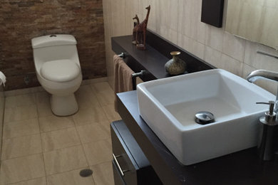 Inspiration for a transitional powder room remodel in Other