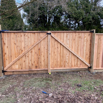 Cedar Shed on top of concrete pad install + 160' fencing with trailer gate