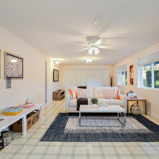 Design ideas for a large classic enclosed home cinema in Seattle with white walls, lino flooring, a wall mounted tv and multi-coloured floors.