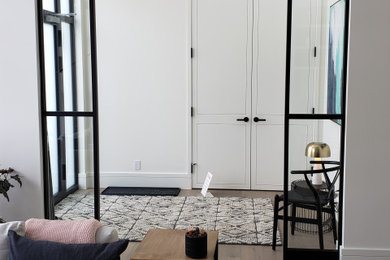 Inspiration for a transitional entryway remodel in Calgary