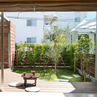 他の地域のアジアンスタイルのおしゃれなデッキ (日よけなし) の写真